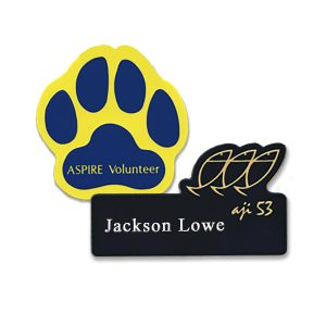 custom shaped engraved name tag assortment in various colors and shapes
