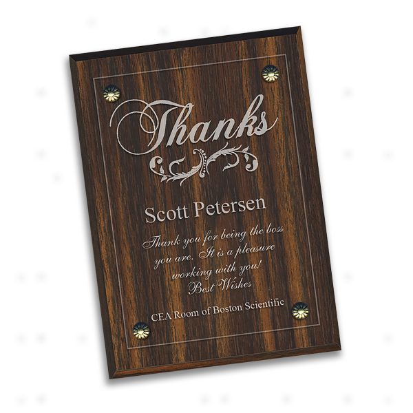 100% laser engraved acryllic plate mounted on a solid walnut or particle wood base, with Thank You logo and personalized inscription