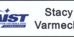 Full color name tag with printed logo and engraved names