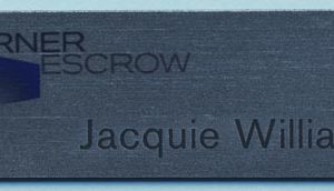 metallic silver name tag with full color printed logo and engraved text