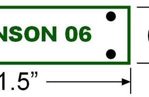 engraved tag with text and drilled holes