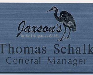 silver name tag with laser engraved logo and engraved name and title