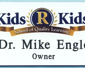 Full color name tag with printed logo and engraved names