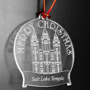 100 percent acrylic Christmas ornament with engraved temple and the words Merry Christmas