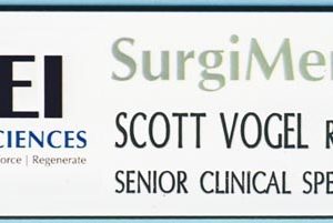 full color name tag with printed logo and engraved text