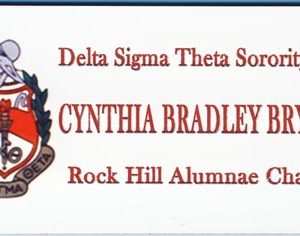 Full color name tag with printed logo and engraved names