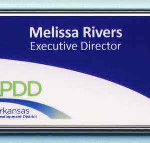 silver framed white full color name tag with printed logo and text