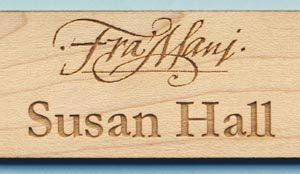 wooden name tag with laser engraved logo and name