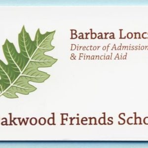 white name tag with full color printed green logo and text