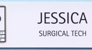 white name tag with full color printed logo and text