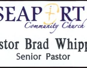 white name tag with full color printed logo and black engraved text