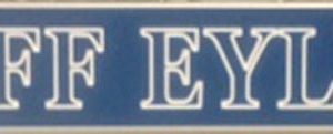 blue name plate with engraved text