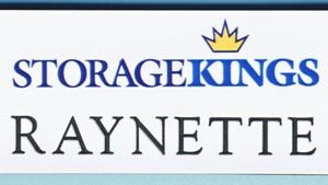 white full color name tag with printed logo and black engraved name