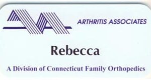 White full color name tag with printed logo and text