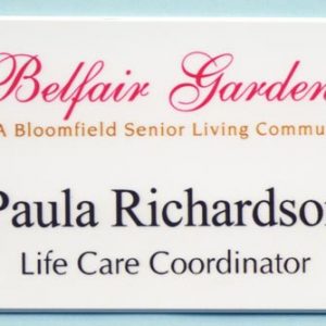 White full color name tag with printed logo and text