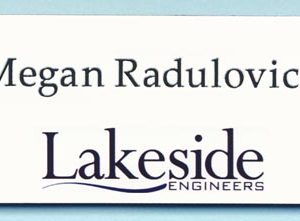White name tag with full color printed logo and black engraved text