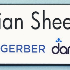 Full color cutout name tag with engraved black text
