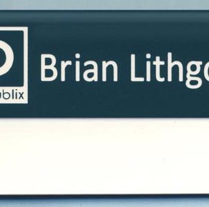 Engraved pinegreen pocket tag with white logo and text