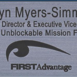 Engraved silver name tag with black logo and text