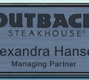 Engraved framed silver name tag with black logo and text