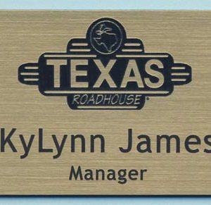 Engraved gold tag with lasered logo and engraved text