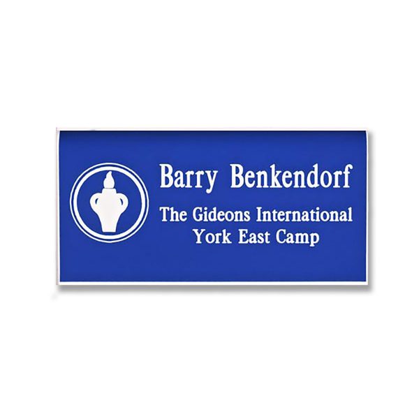 Blue tag with engraved white Gideons International logo and names and titles.