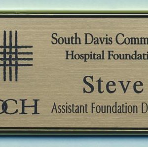 Engraved gold framed name tag