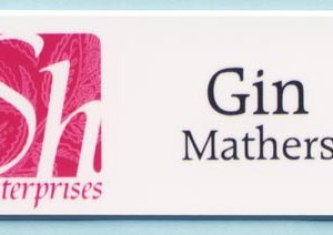 Full color custom shaped tag with 1 line of text