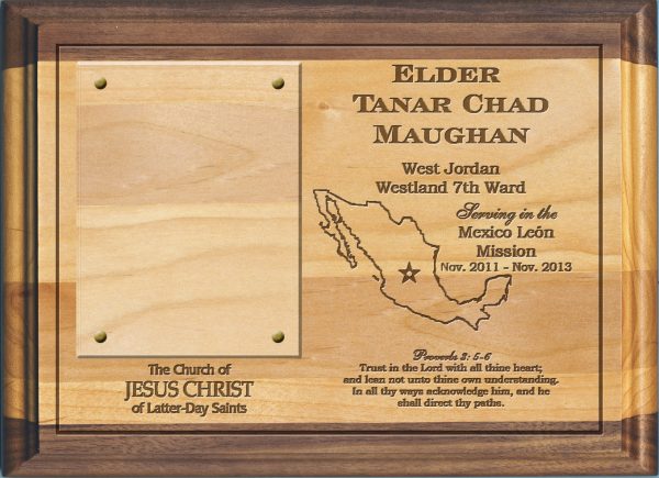 laser engraved lds missionary plaque on solid alder wood with dark accents at top & bottom, featuring missionary's name, dates of service, mission boundaries, favorite scripture passage, and a clear window for inserting a 3.5" x 2" photo