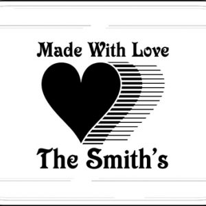 Laser engraved 9 x 13 casserole dish / glass baking dish with heart graphic & the words "Made With Love" and 1 line of personalized text engraved on the underside of the dish