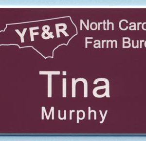 Engraved name tag with logo and name
