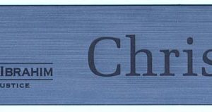 Engraved name tag with logo and name