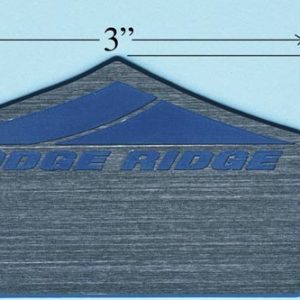 metallic silver name tag with blue engraved logo and text