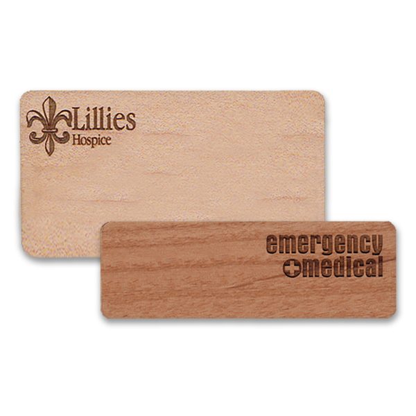 Wooden name tags with engraved logos on premium high-quality wood.