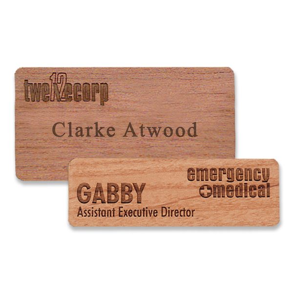 Wooden name tags with engraved logo and text cut from high-quality premium wood.