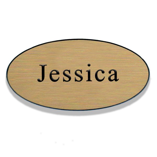 Oval shaped restaurant name tags with multiple wood grain finishes.