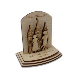 Laser-engraved 3-D birch wood LDS temple puzzle featuring the words "I Love To See The Temple" & inset of small children in front of the temple
