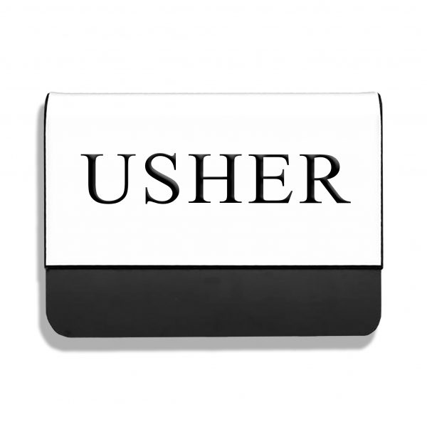 White pocket name tag with USHER engraved on it in capital letters