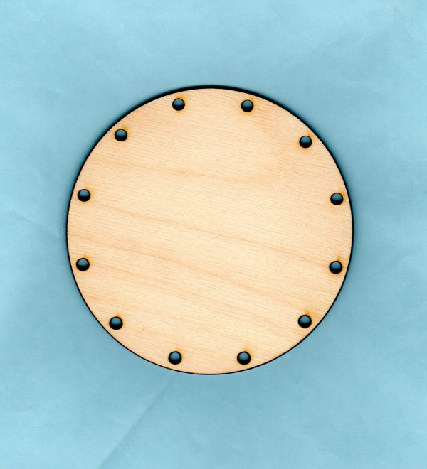 Circle basketry merit badge base with 12 holes for reed