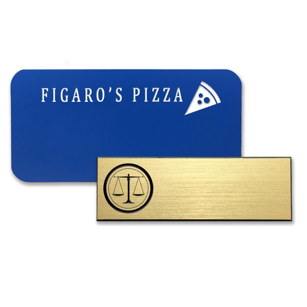 Plastic blue and gold name tags with engraved logos.
