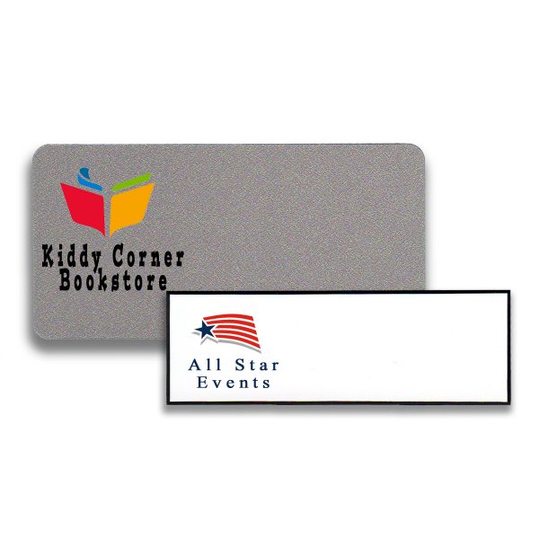 Full color printed name tags, silver background and white background, with a logo only.