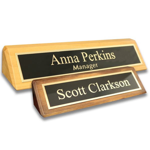 Alder desk wedges with laser engraved metal name plates with lines of text.