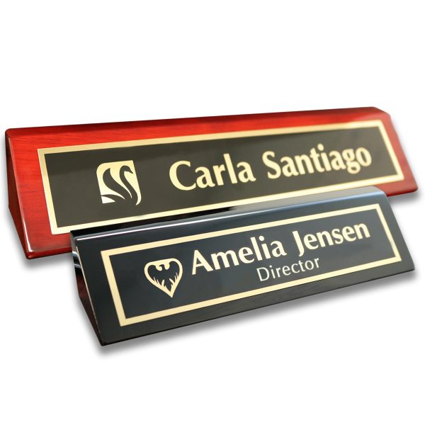 Piano finish desk wedges with metal name plates attached. Logo and text lines on red piano finish base and black piano finish base
