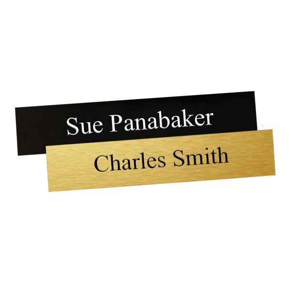Fast name plates with 1 line of engraved text. In black with white engraving and gold with black engraving.