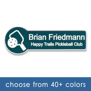 Green pickle ball tag with engraved logo and text.