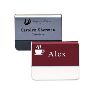 Silver and red plastic pocket name tags with engraved logos and text.